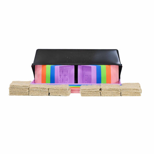 Colorful plastic seedling pots and brown coco coir grow mats in a black tray. Complete seed starting kit for gardening.