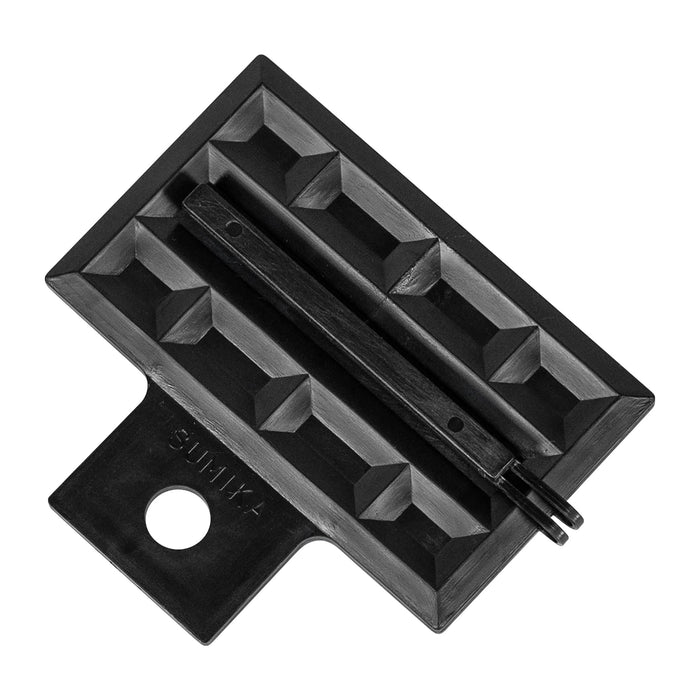 Black SUMIKA construction tool featuring a geometric textured grid, central guide, and two alignment prongs.