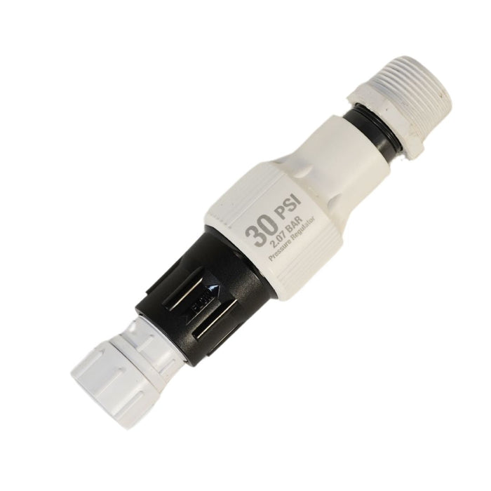 White and black 30 PSI (2.07 BAR) pressure regulator for irrigation, featuring a flow arrow and threaded connections.